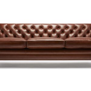 The Formalis Sofa - Shown here in a chestnut brown Semi-Aniline hide featuring a subtle two-tone effect, with legs in natural oiled walnut.