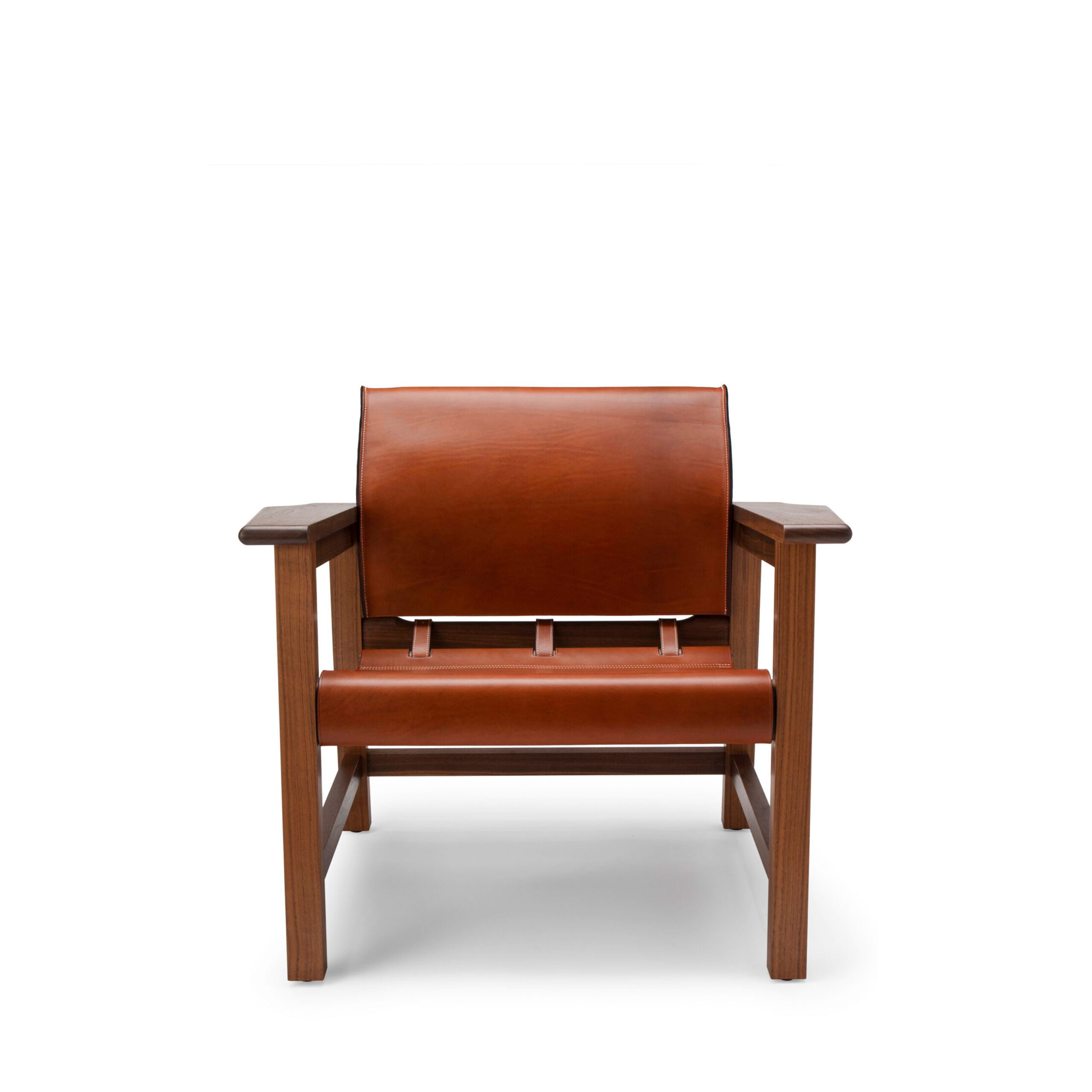 The Saddle Up Chair - Shown here in natural oiled walnut with tan saddle leather seat and back, featuring solid brass harness buckles, escutcheon pins and contrast stitching.