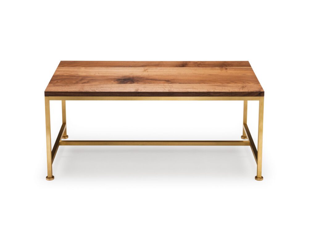 The Orichal Coffee Table - Shown here in natural oiled walnut and brushed brass. The top is made from solid and veneered timber. The frame is precision engineered from solid brass.